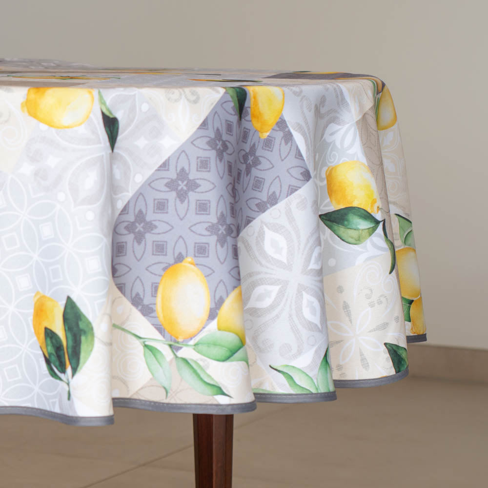 Tovaglia antimacchia rotonda giallo limone e beige con fantasia limoni