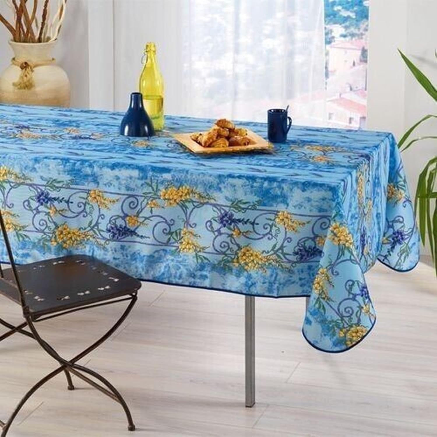 tovaglia-antimacchia-azzurro-glicine-blu-rotonda

Alt text: