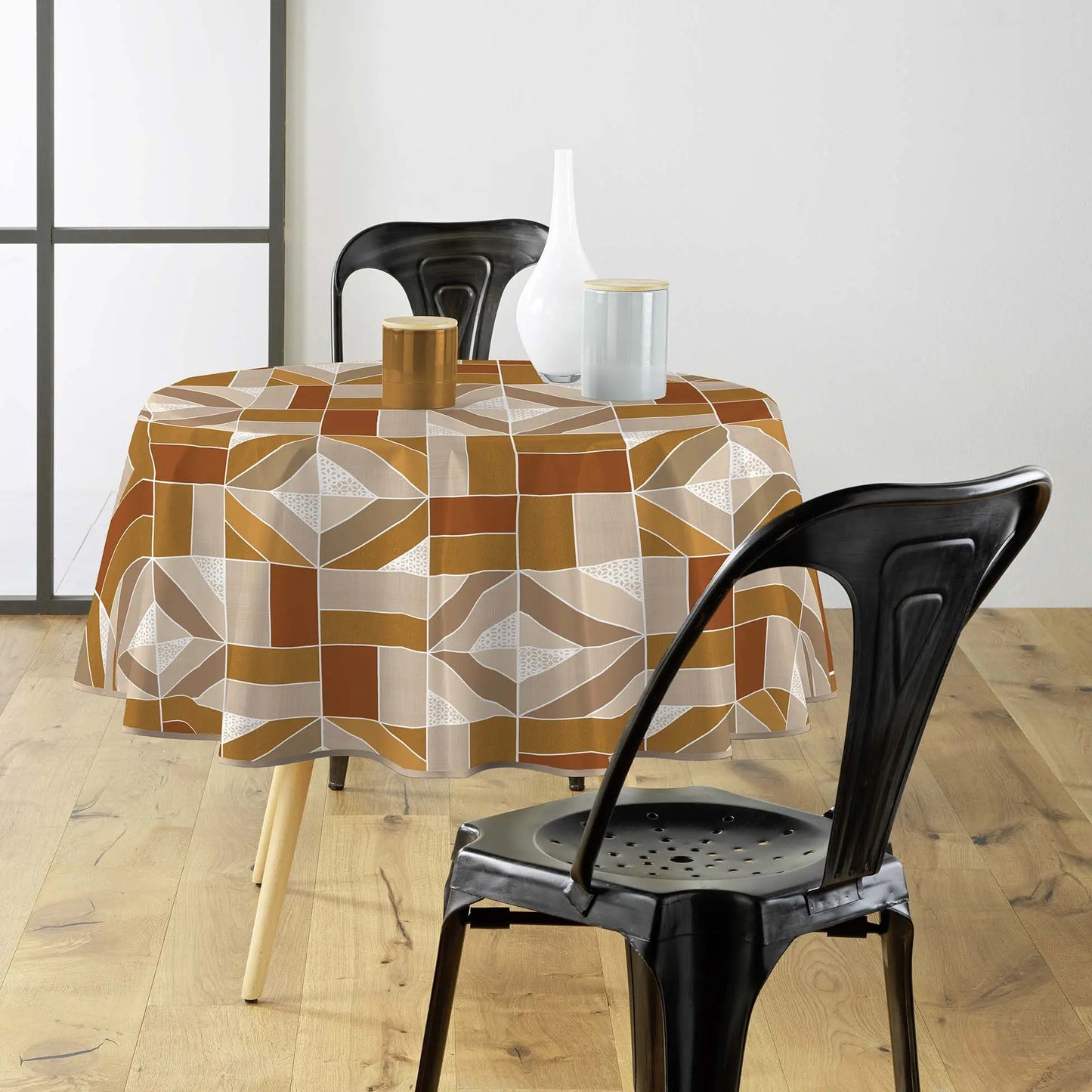 Tovaglia antimacchia rotonda beige e ocra con design geometrico elegante