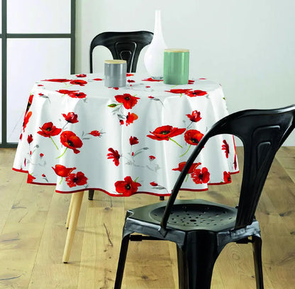 tovaglia antimacchia bianca con motivo floreale su tavolo rotondo